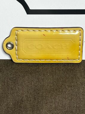 Coach Butter Yellow 2.5” Patent Leather Hangtag